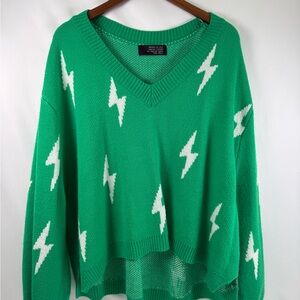 Dressed in LALA V-Neck Green Sweater with White Lightning Bolts